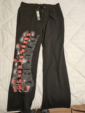Black Sweatpants with Red Graphic Lettering